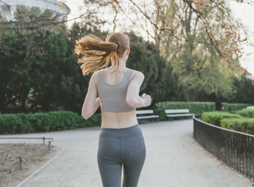 woman running in her neighbourhood