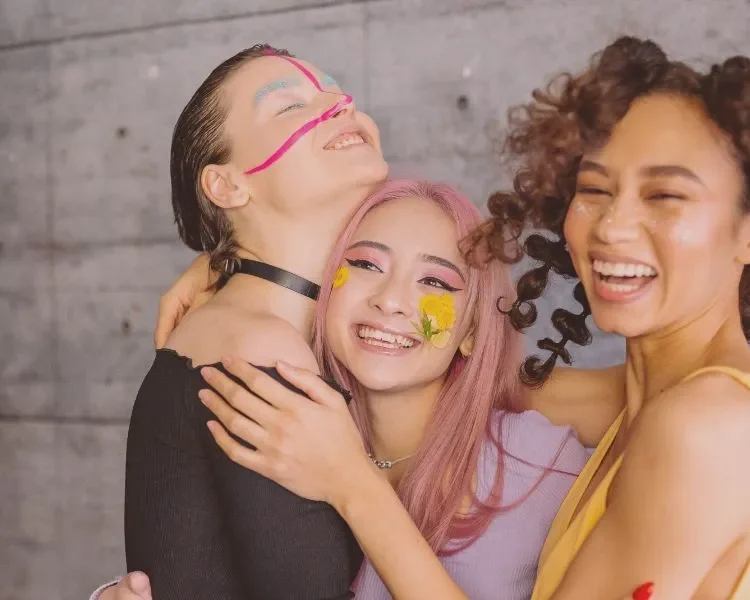 three happy high school girl friends