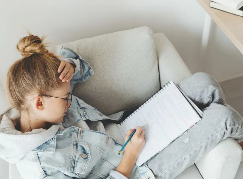 college student working on her assignment