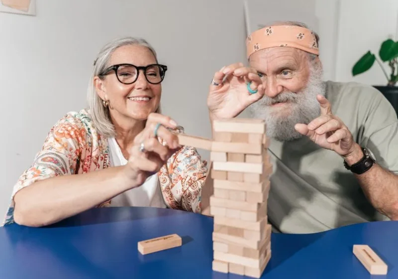 senior couple playing scrabble together