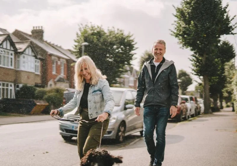 couple walking their dog