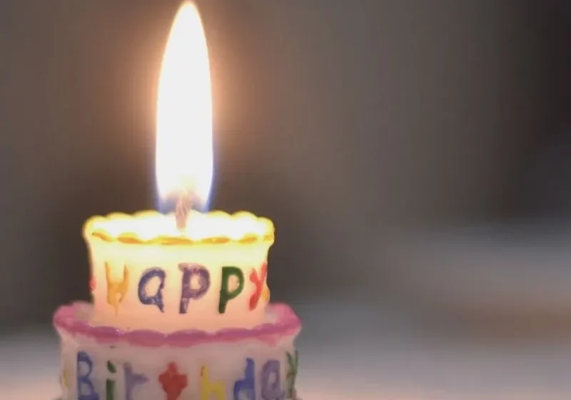 a happy birthday candle
