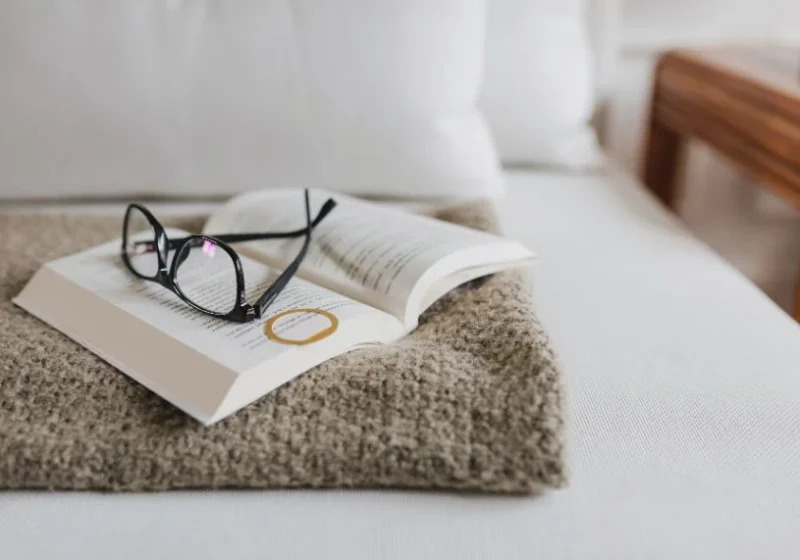 glasses on top of a book