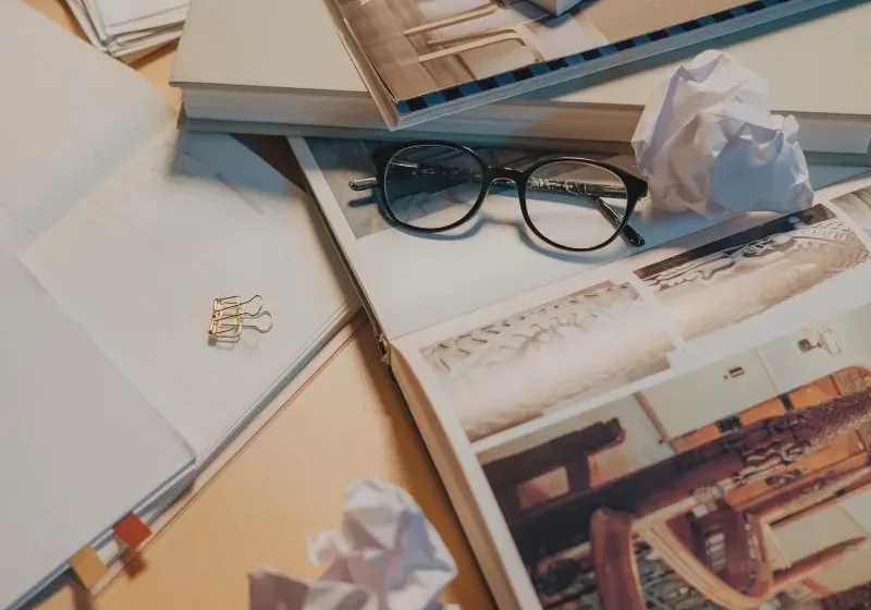 desk filled with stuff