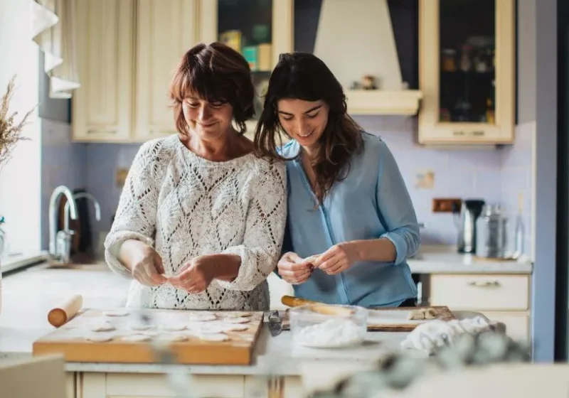 mother and daughter bonding time, making dumplings together