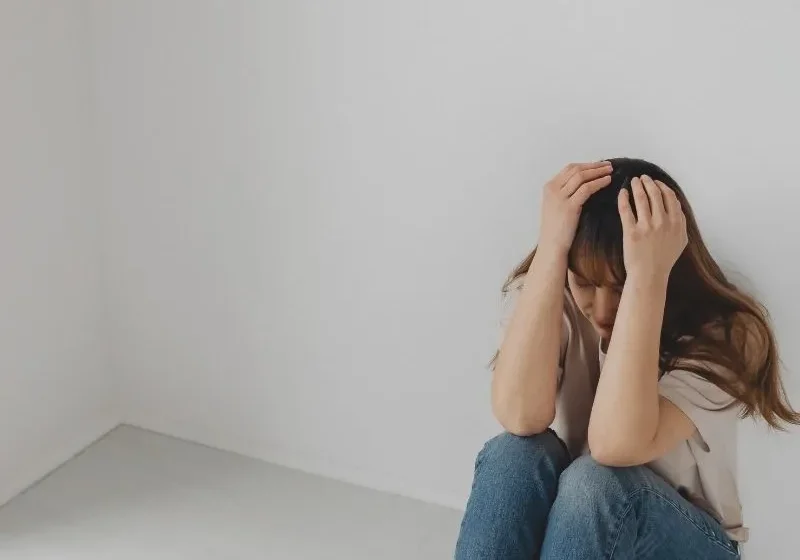 an unhappy woman with unhappy habits that's making her deeply unhappy