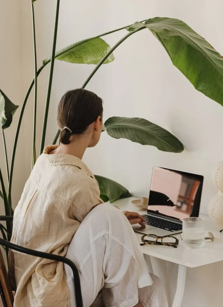 woman looking at her computer screen: what your ai conversation reveals about you
